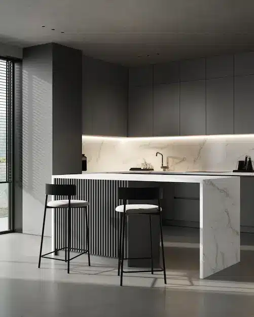 Professional kitchen designer discussing renovation plans and cost estimates with a client in Melbourne